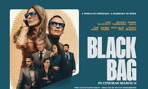 "Movie poster for Black Bag (2025), featuring a sleek black tactical bag with mysterious contents, set against a shadowy espionage backdrop. Stars David Oyelowo and Naomie Harris in a tense spy thriller directed by Steven Soderbergh."