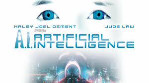 "Close-up of Haley Joel Osment as David, a wide-eyed robotic boy with synthetic skin, his face partially illuminated by blue light. The background shows futuristic cityscapes underwater with the tagline: 'His love is real. But he is not.'"