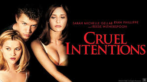 *"A promotional poster for the 1999 film 'Cruel Intentions' shows actors Sarah Michelle Gellar and Ryan Phillippe as wealthy step-siblings Kathryn and Sebastian, dressed in elegant late-90s attire. They stand close, smirking with calculated confidence, against a dark backdrop. The tagline 'Sex. Power. Revenge. Seduction.' appears below, emphasizing the film's themes of manipulation and decadence."*