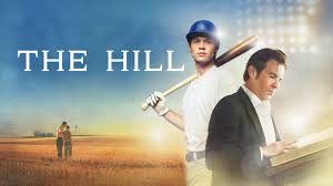 *"Sean Connery as a determined prisoner in a 1960s British military prison, standing defiantly atop a steep, sun-scorched hill during a grueling punishment drill. Soldiers in uniform watch below as dust swirls around the stark desert-like setting."*