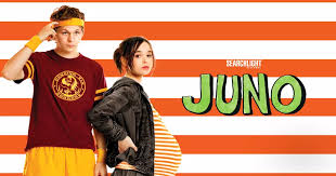 "Juno (Elliot Page) stands with hands in hoodie pockets against an autumn tree backdrop, her pregnant belly visible under a striped t-shirt. The handwritten title 'Juno' appears in quirky yellow letters with doodle-style hearts, capturing the film's offbeat charm."