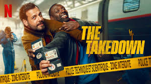 *"Two mismatched cops stand back-to-back ready for action - Omar Sy as the charismatic Ousmane in a leather jacket holding a pistol, and Laurent Lafitte as the uptight François in a wrinkled suit clutching a briefcase. Explosions and neon city lights glow behind them, with the title 'The Takedown' in bold yellow letters."