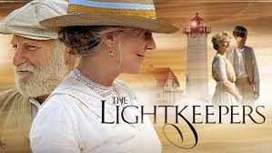 "Richard Dreyfuss as Seth, a bearded lighthouse keeper in a wool cap, scowls at a giggling Blythe Danner on a windswept Cape Cod beach, wooden rowboat in the background."