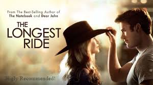 "Romantic movie poster for The Longest Ride featuring Scott Eastwood as a cowboy holding Britt Robertson, with a sunset and rolling fields in the background. Text reads 'The Longest Ride' in elegant cursive."